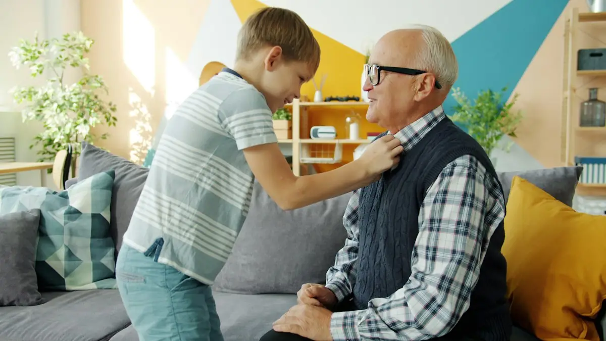 A boy straightening his grandfather's collar at home